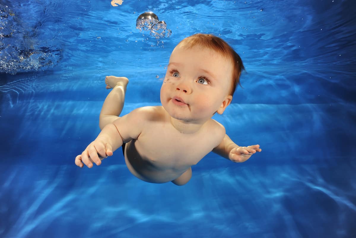 Baby girl swiming