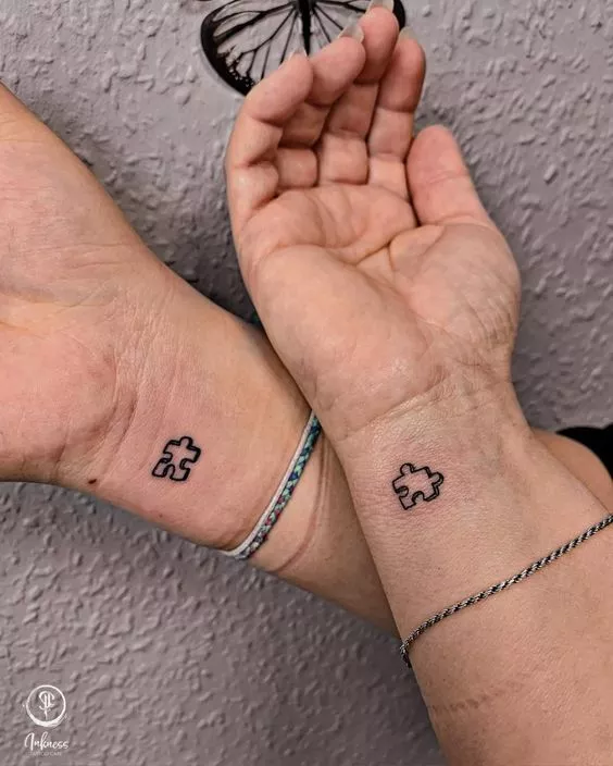 7. Small Matching Tattoos