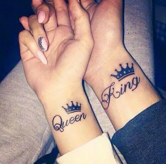 17. Husband And Wife Matching Tattoos